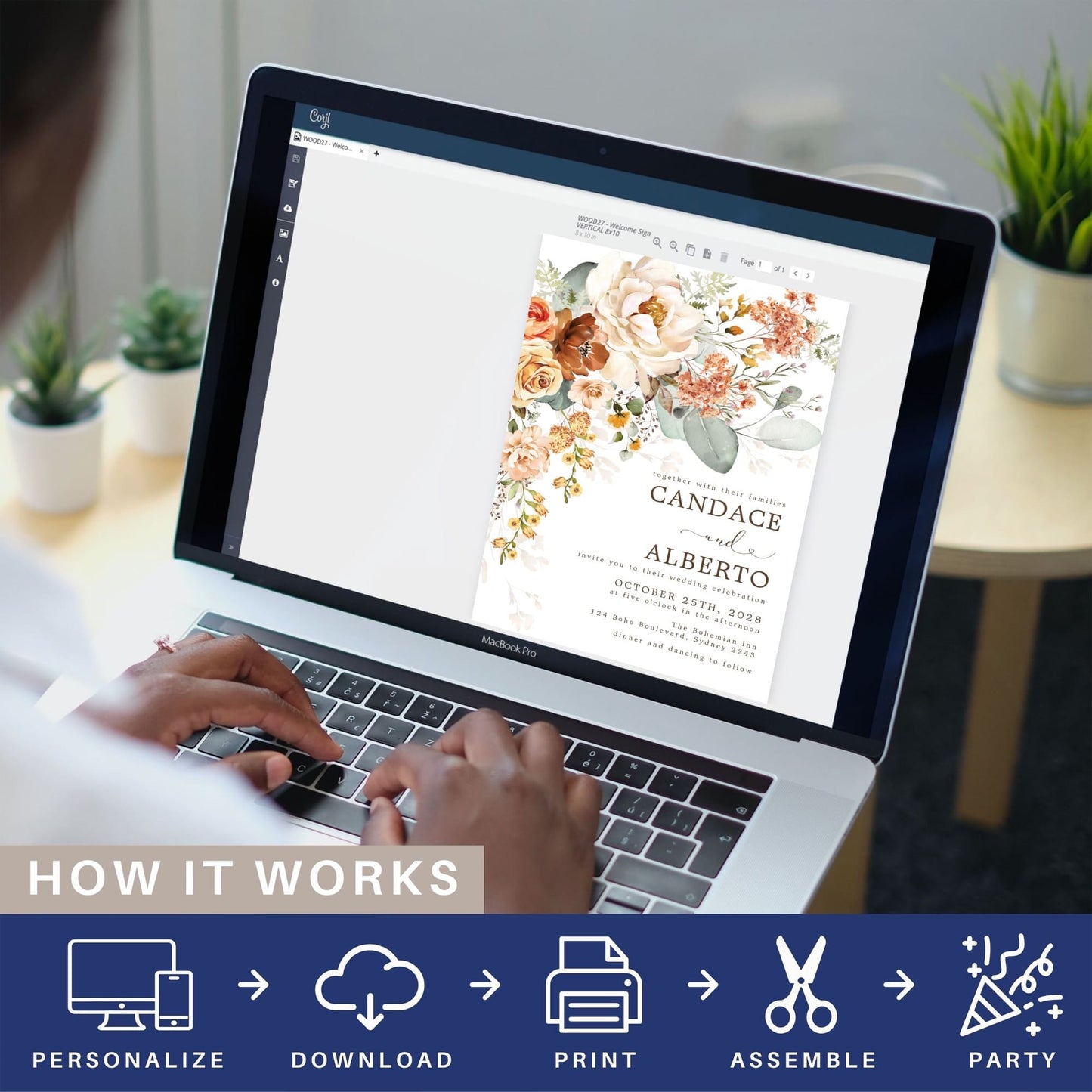 editing a diy boho wedding invitation on a laptop