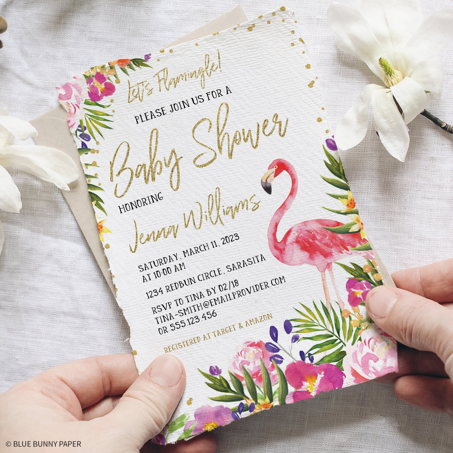Flamingo Baby Shower Invitation held in hands