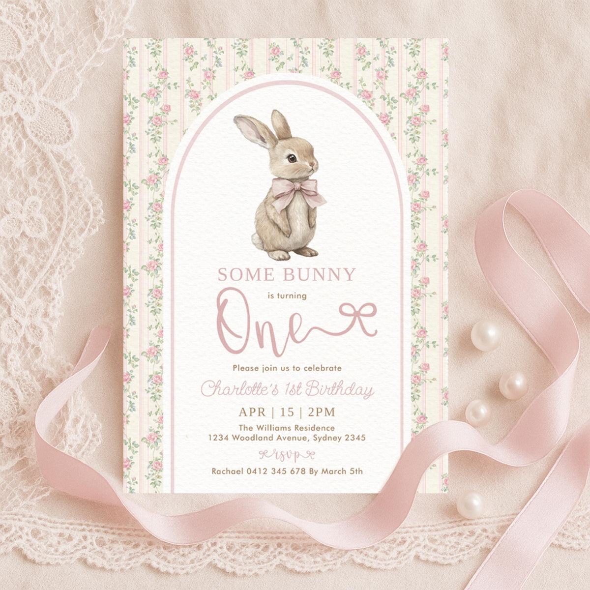 Printed 5x7 some bunny is one invitation with a bow-tied rabbit on pink rose stripe, held by a ribbon
