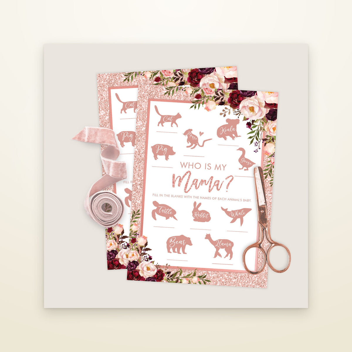 Who Is My Mama baby shower game card with animal silhouettes, ribbon and scissors