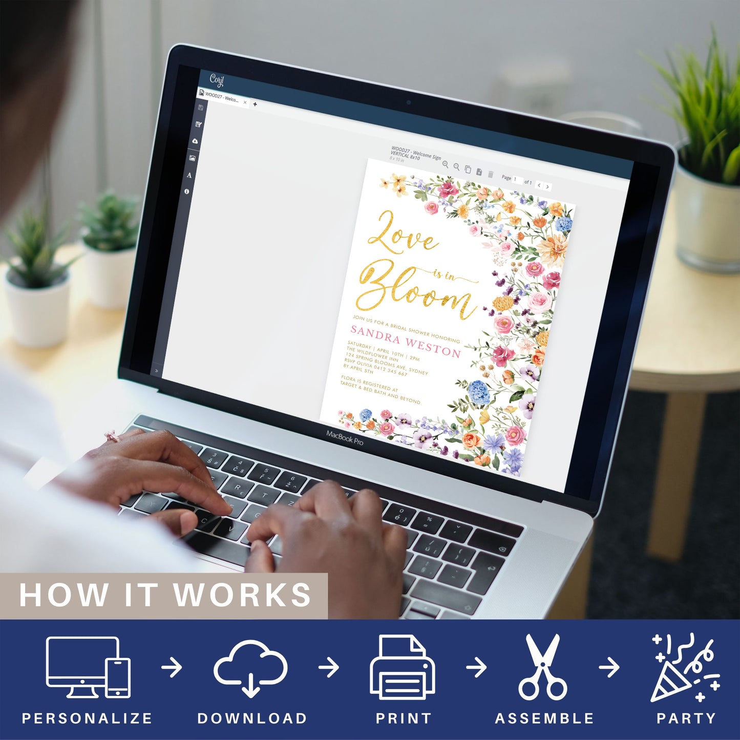 editing a bridal shower invitation on a laptop