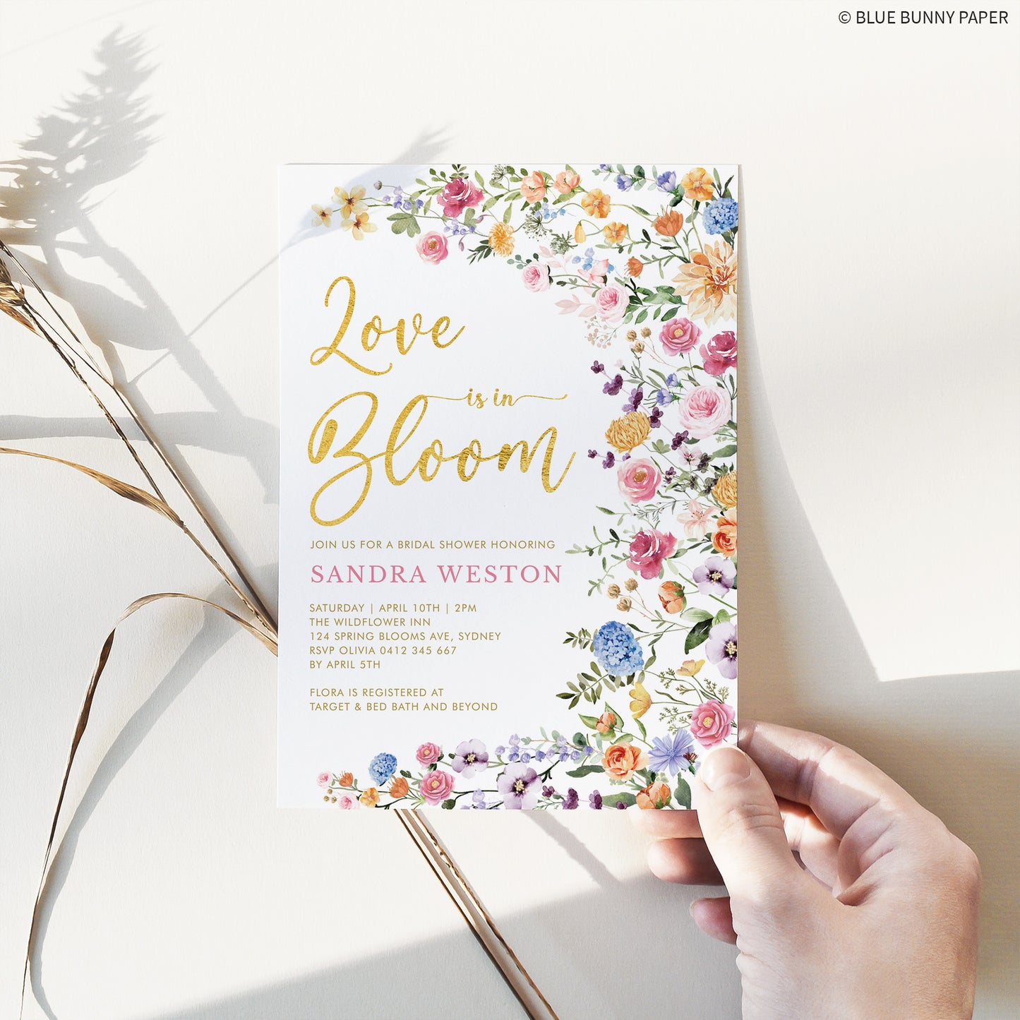 Bridal Shower Invitation held in one hand