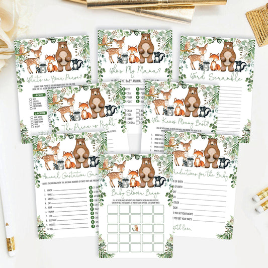 Eight woodland baby shower game cards fanned out, including bingo, word scramble and predictions