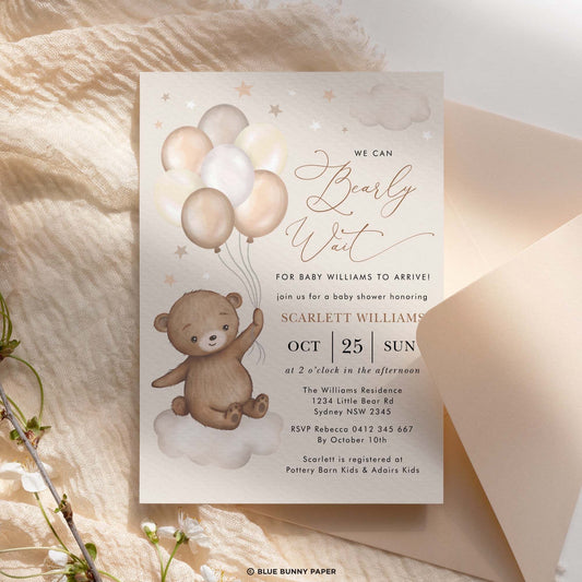 we can bearly wait invitation card with a bear holding balloons
